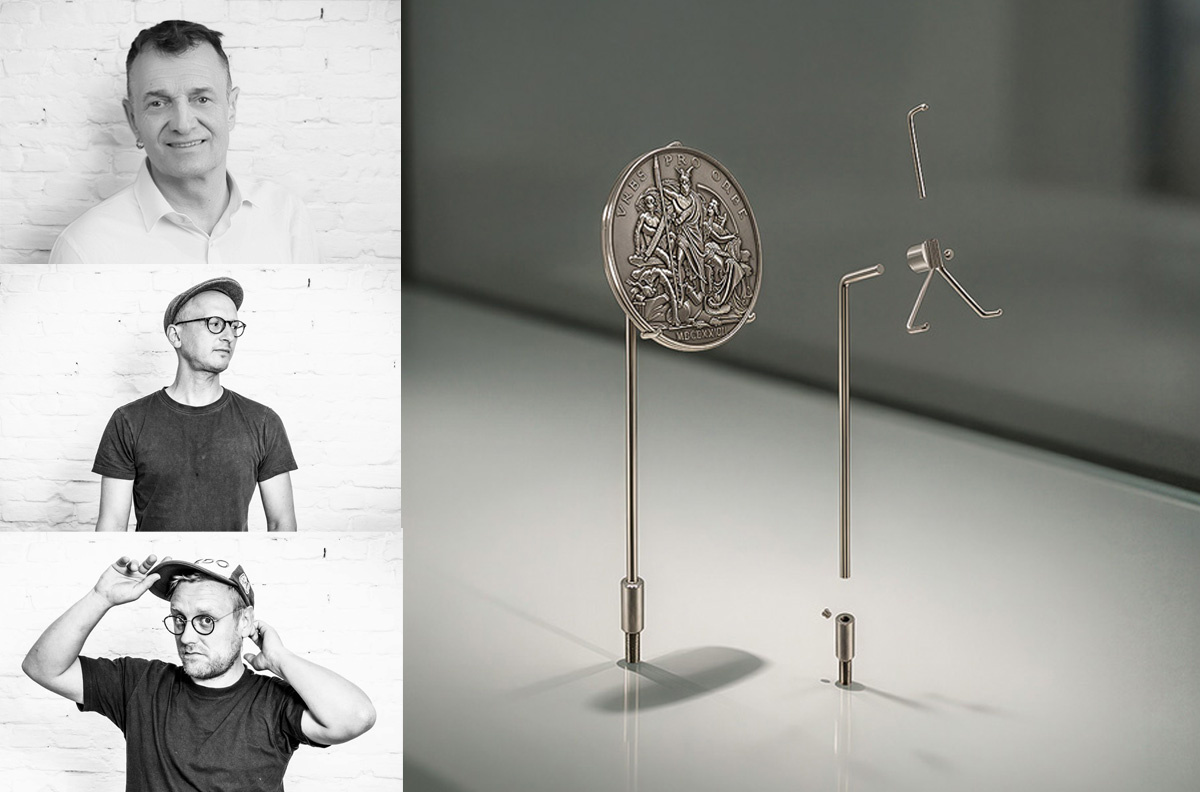 KLIO-Halterung mit montierter Silbermedaille, daneben Explosionsansicht von BASE-, LINK- und TOP-Element